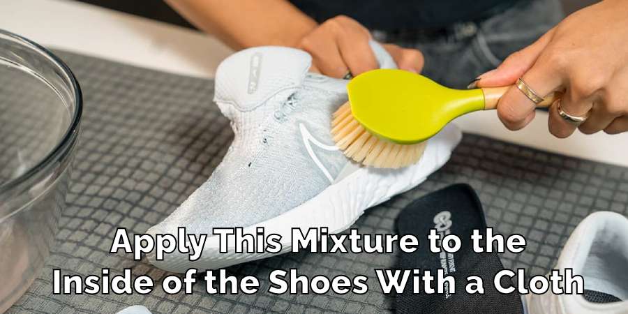 Apply This Mixture to the
Inside of the Shoes With a Cloth