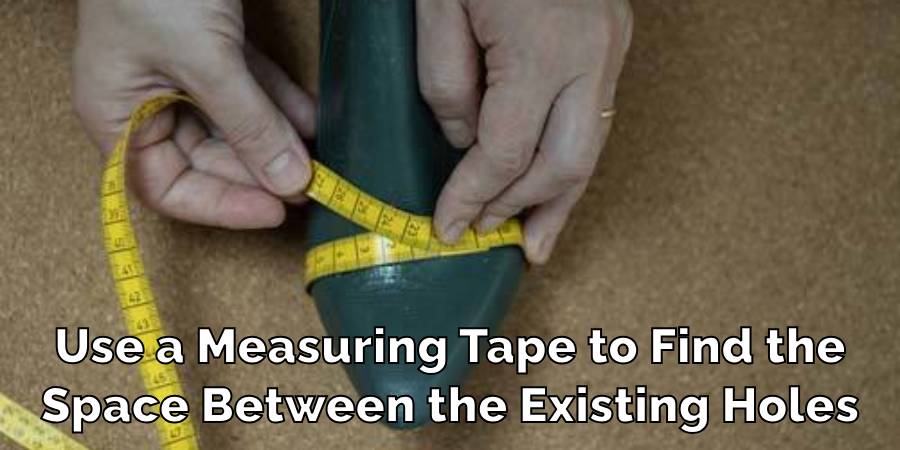 Use a Measuring Tape to Find the Space Between the Existing Holes