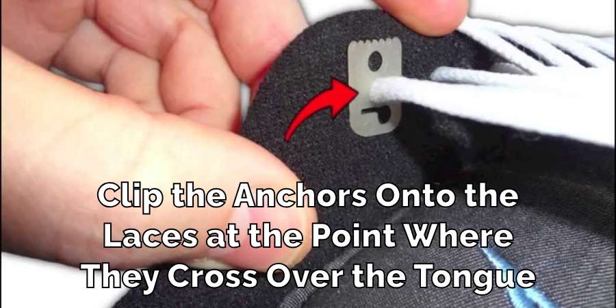 Clip the Anchors Onto the
Laces at the Point Where
They Cross Over the Tongue