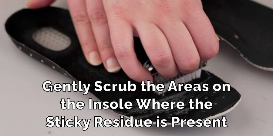 Gently Scrub the Areas on
the Insole Where the
Sticky Residue is Present