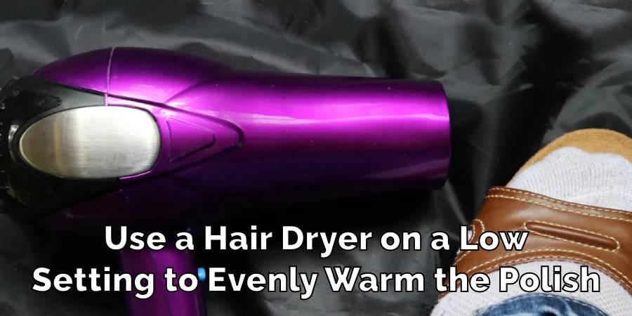 Use a Hair Dryer on a Low
Setting to Evenly Warm the Polish